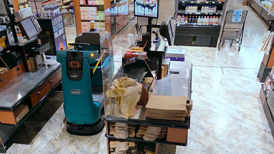 食料品店を掃除する、テナントのロボット型フロアスクラバー